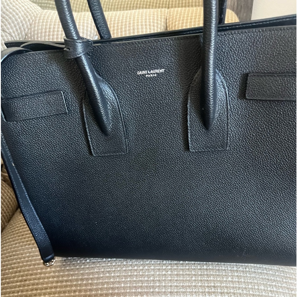 Some of my purses in my own closet